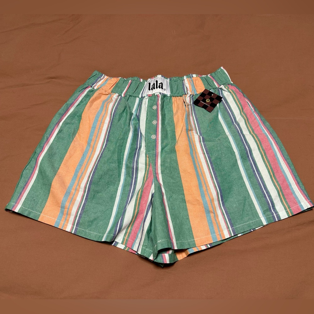 Never worn boxer-style type shorts, still has tags attached!